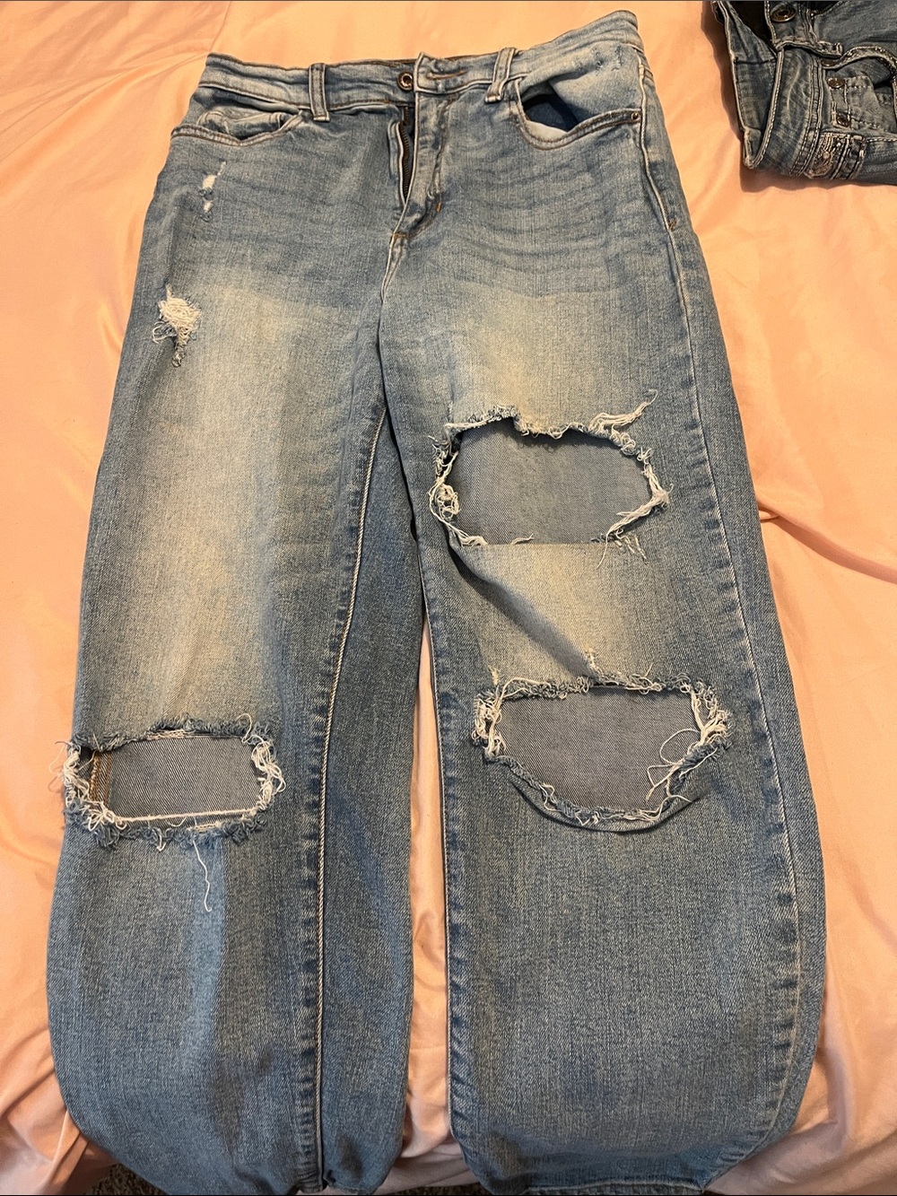 Light Blue Distressed Boot Cut Jeans with Raw Hem Details
